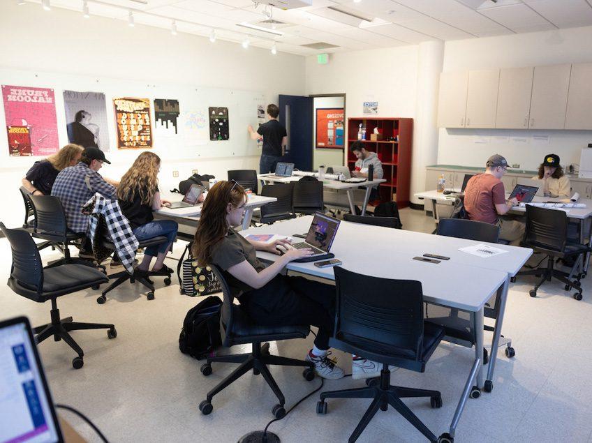 Wide view of the Communication Design Lab for graphic design students.